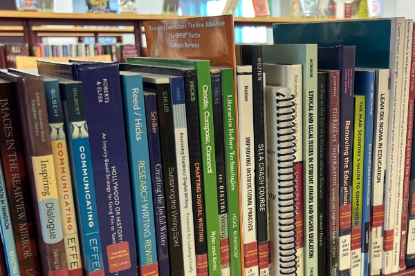 Close-up image of books on shelf that represent the Book Recognition Event collection in the Library.