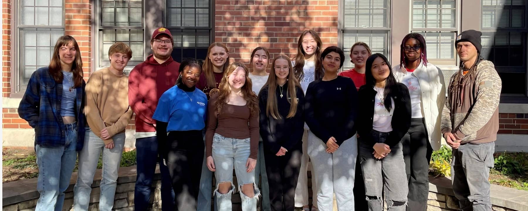 a group of people posing for a photo