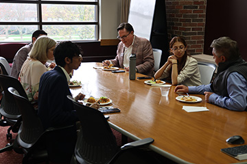 Students and alumni meet with Dean Chris Moberg during a networking lunch for CMU’s Dean’s Student Advisory Board.