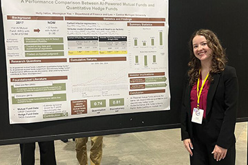 CMU student Holly Ireton stands next to a poster presentation on AI in asset management at an academic conference.
