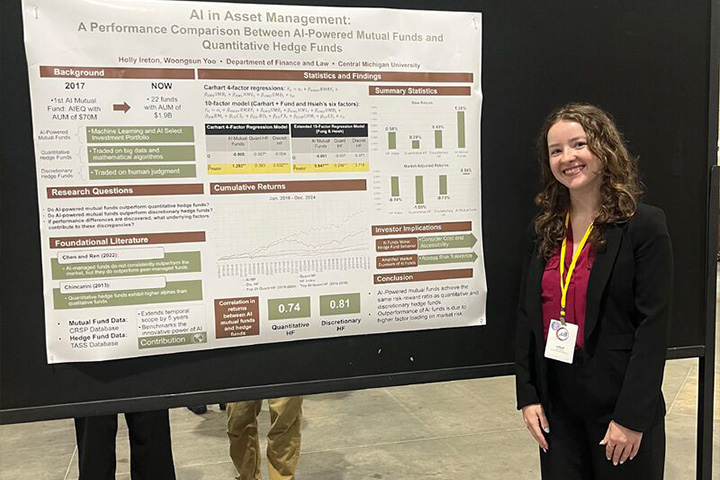 CMU student Holly Ireton stands next to a poster presentation on AI in asset management at an academic conference.