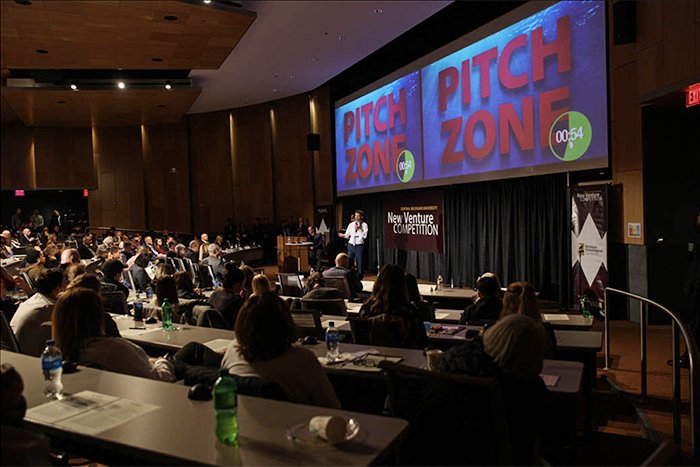 Student team pitching at the new venture challenge