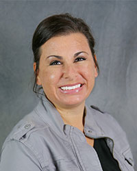 a close-up of a woman smiling