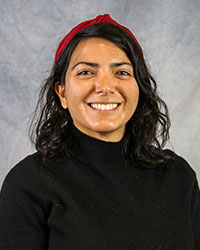 Headshot of Bahar Salehi wearing a black blouse.