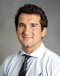 Lopez-Burgos,-Emilio-web Emilio Lopez-Burgos is in a white shirt and tie