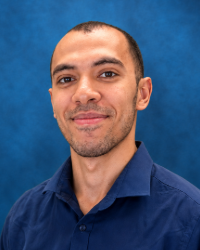 a man in a blue shirt