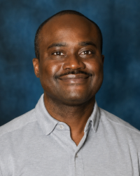 a man in a gray shirt