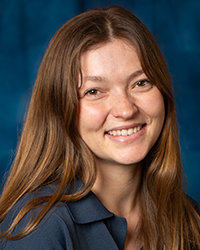 a woman smiling at camera