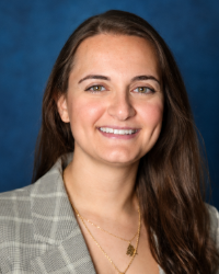 a woman smiling for a picture