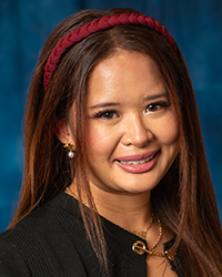 a woman smiling at the camera