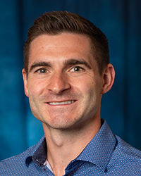 a man in a blue shirt