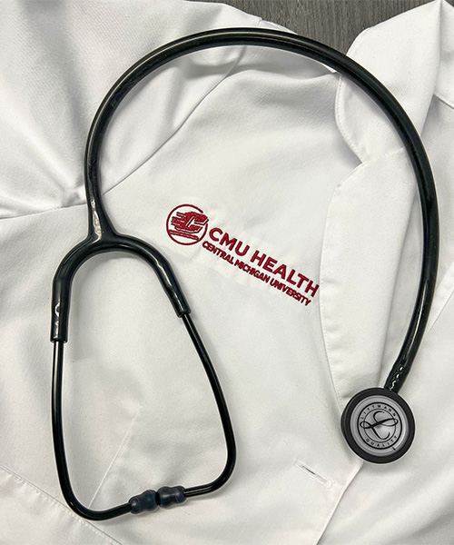 CMU Health white coat with stethoscope