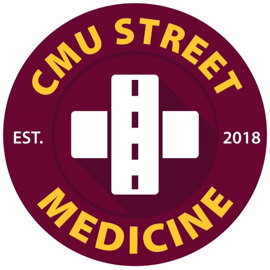 A circular maroon logo with the text CMU Street Medicine in yellow around the edge. In the center, there is a white cross with a vertical road icon superimposed. Est. 2018 is also written in white on either side of the cross.