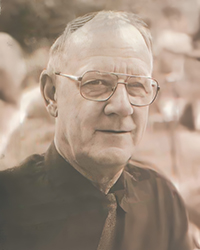 Headshot of James Hough, a greyscale image cut from a newspaper