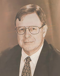 20250415_HallFame_JWojcik_001_250x250 Headshot of Jim Wojcik, a greyscale image cut from a newspaper.