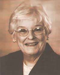 Headshot of Suzanne Nichols, a greyscale newspaper clipping