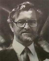 Headshot of Thomas R Rood, a greyscale newspaper clipping