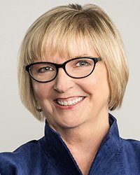 Headshot of Lorrie Lynch in front of a white backdrop
