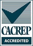 Cacrep_cm_PMS CACREP Accredited graphic with a check mark in front of horizontal lines.