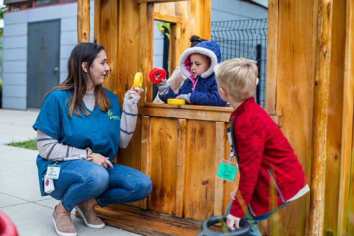 20190909_CDLL_kids interacting with adult outside_001_700x467 kids interacting with adult on playground