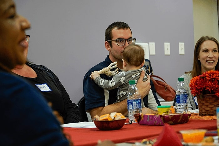 Dad holding baby