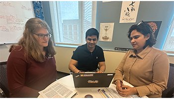 Vimal is working with their supervisors, Parveeza Gala and Christina Prout, in the MSA office.