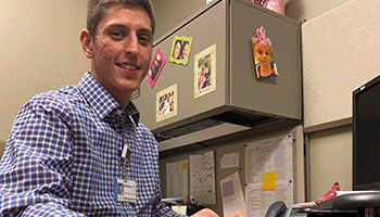 Intern Zachary Sleeman works on physician scheduling at MyMichigan Health in Midland.