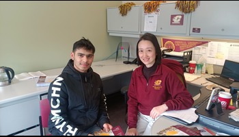 Piyush Bapna working with his supervisor Katy Wang at the Office of International Affairs and Graduate Recruiting.