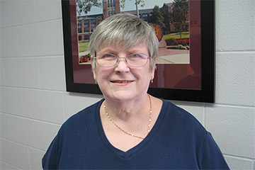 Image of the late Martha Logsdon wearing a blue shirt