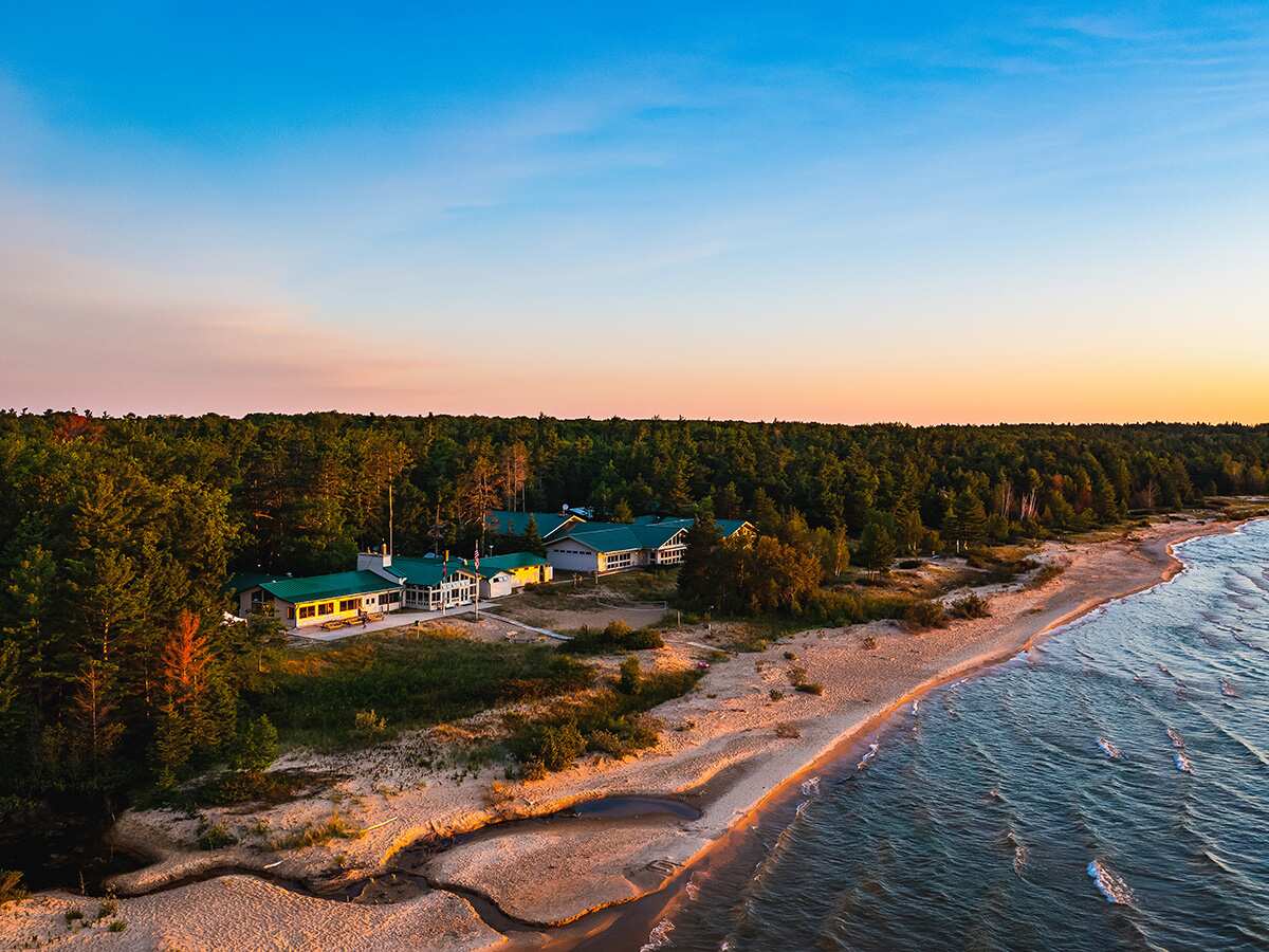 An aerial view of the CMU Biological Station on the shore of Lake Michigan.