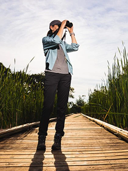 Student with binoculars