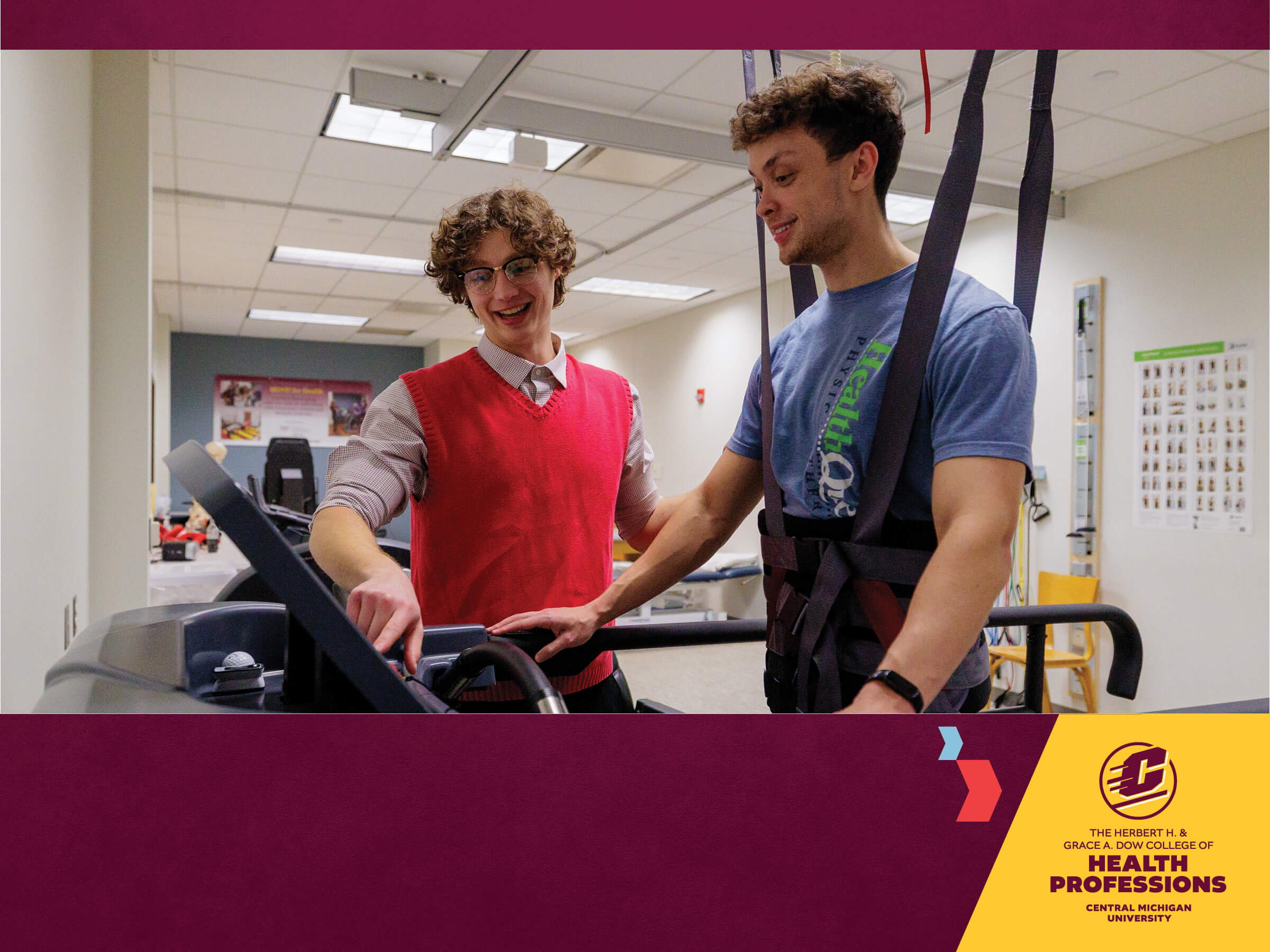 physical therapy student helping a student in a harness onto a treadmill