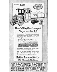 An old newspaper advertisement for a transport truck.