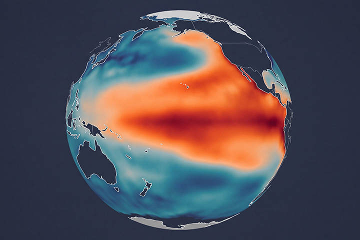 12150_Super El Nino Q&A_GEN_CSE_AWA_27 720x480 An image of Earth showing the Pacific Ocean with a large swath of red stretching across it