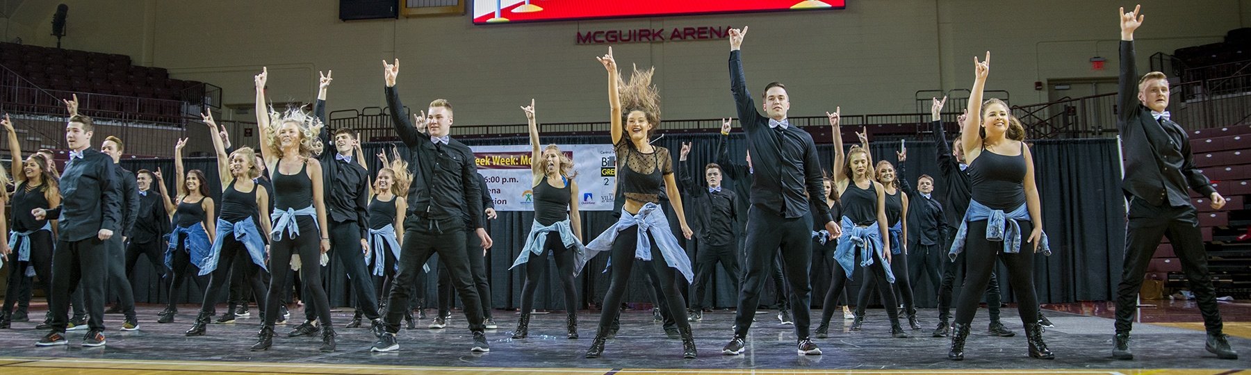Students perform during Greek Life event