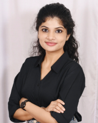 a woman with her arms crossed