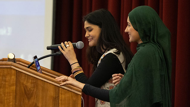 international_640x360 Two students dressed in cultural clothing celebrating APAHM