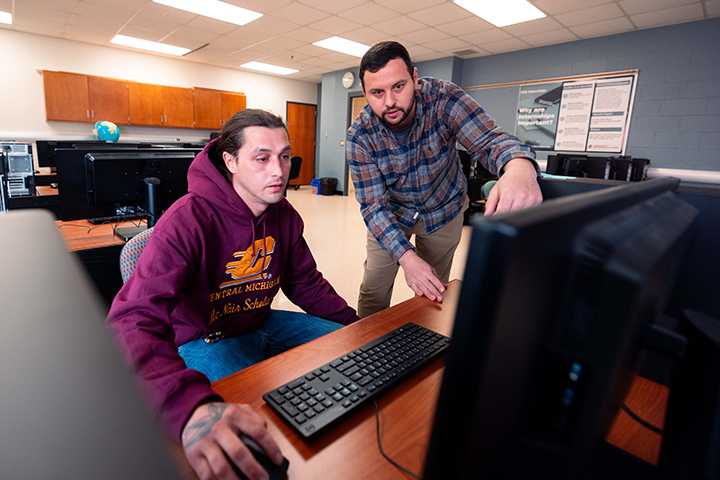 Timothy Kern and Dr. Adam Gallaher research Environmental Injustice:&nbsp;A Cry to End Environmental Segregation during the McNair Research Institute 2026.